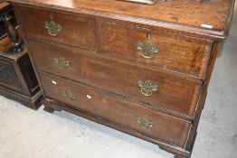 A Georgian oak chest of two over two drawers, having brass handles, width approx. 102cm