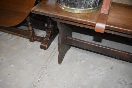 A vintage oak refectory style form bench, width approx. 137cm