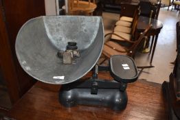 A set of traditional shop balance scales and selection of weights