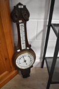 An early 20th Century oak cased barometer