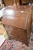 An Edwardian mahogany dwarf bureau, width approx. 60cm