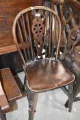 A traditional wheelback kitchen chair