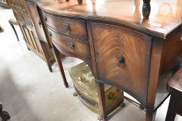 A reproduction Regency sideboard