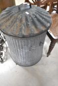 A traditional galvanised dustbin