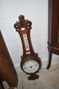 An early 20th Century mahogany cased aneroid barometer