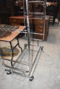 An industrial style chrome clothes rail, height approx. 145cm