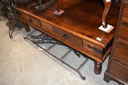 A modern hardwood coffee table of large dimensions, approx. 135 x 75cm