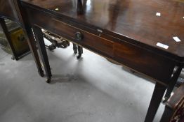 A 19th Century mahogany fold over tea table, width approx. 93cm