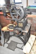 A Victorian saddlers treadle/hand crank sewing machine by Singer