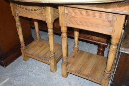A pair of pine occasional lamp tables