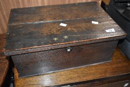 A period oak box of small proportions having iron hardware, approx. dimensions W45 D30 H17cm