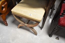 A traditional savanarola dressing table stool