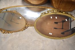 Three assorted gilt frame wall mirrors