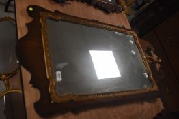 A 19th Century Chippendale style wall mirror with gilt heightened and phoenix decoration, approx. 88