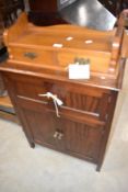 An early to mid 20th Century mahogany side cabinet and a set of dressing table jewellery drawers