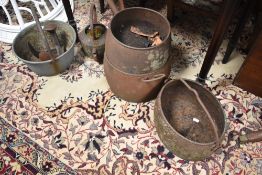 A selection of cast iron pans, last etc