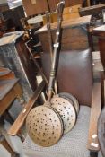 Three traditional warming pans/chestnut roasters