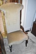 A traditional Victorian style prayer chair having dralon upholstery