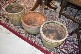 Three clay garden planters