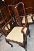 A set of six (four plus two) Queen Anne style mahogany dining having vase splat backs and later