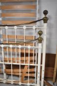 A reproduction Victorian style metal double bed frame (to fit 4ft6 mattress)