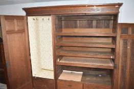A Victorian mahogany triple wardrobe/linen press having central mirrored door, width approx. 190cm