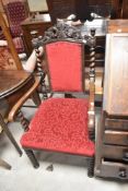 A 19th Century twist frame carver chair having later burgundy upholstery