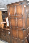 A traditional panelled oak single wardobe, approx dimensions H199 W78 D56cm