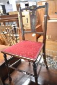 A late 19th or early 20th Century mahogany bedroom chair