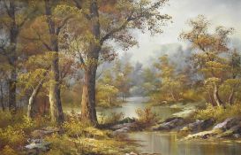 C Inness (20th century) oil on canvas, autumnal woodland river scene, signed lower left, within a