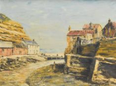 W A Crocker (British 20th century) oil on canvas 'Staithes' (North Yorkshire) harbour scene,