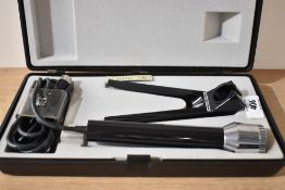 A vintage cased Grundig GM-313 desktop microphone