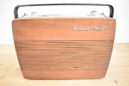 A vintage Kurer Radionette radio having wooden front and rear made in Norway