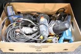 A carton of assorted electric power tools including a Black & Decker Angle Grinder, an Atlas Copco