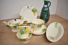 A Clarice Cliff Newport Pottery oval corn on the cob dish 25cm (hairline to rim) sold along with