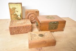 A group of carved wood jewellery boxes, ( 5 ).