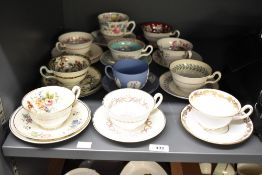 A selection of mainly Wedgwood matching cups saucers and plates, some duos and some triplets