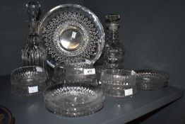 A matching pressed glass cake plate with six side plates and dessert set and two vintage decanters.