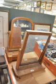 A late 19th / early 20th oak dressing table mirror, h46cm, sold together with a walnut dressing