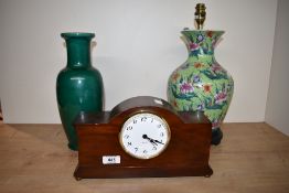 A Chinese style table lamp having multi-coloured lily design on a lime green ground, a green crackle