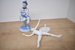 A late 20th century West German Kaiser bisque porcelain ice skater figurine, modelled balancing on