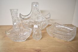 A collection of glass and crystal including two baskets one being very large.