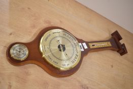 A modern British made banjo style barometer