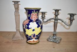 A heavy Victorian Neo Classical style cast iron candlestick, having classical motifs, H30cm, sold