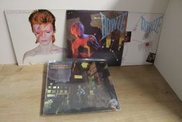 A lot of three David Bowie albums showing some sleeve wear but nothing serious - viewing