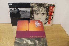 A lot of three U2 albums as in the photos VG/VG+ - light sleeve wear - nothing serious