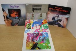 A lot of five rock / metal interest vinyl albums including and early and rare Nazareth ' Exercises '