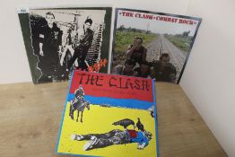 A lot of three albums by the Clash. VG/VG+ . Combat Rock still in shrink