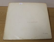 A top opening White by the Beatles - double and numbered - 0017719 - which is relatively low ,