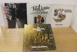 A twelve album lot as per photos with a Stones ' zip sleeve ' and more on offer - good dealer /